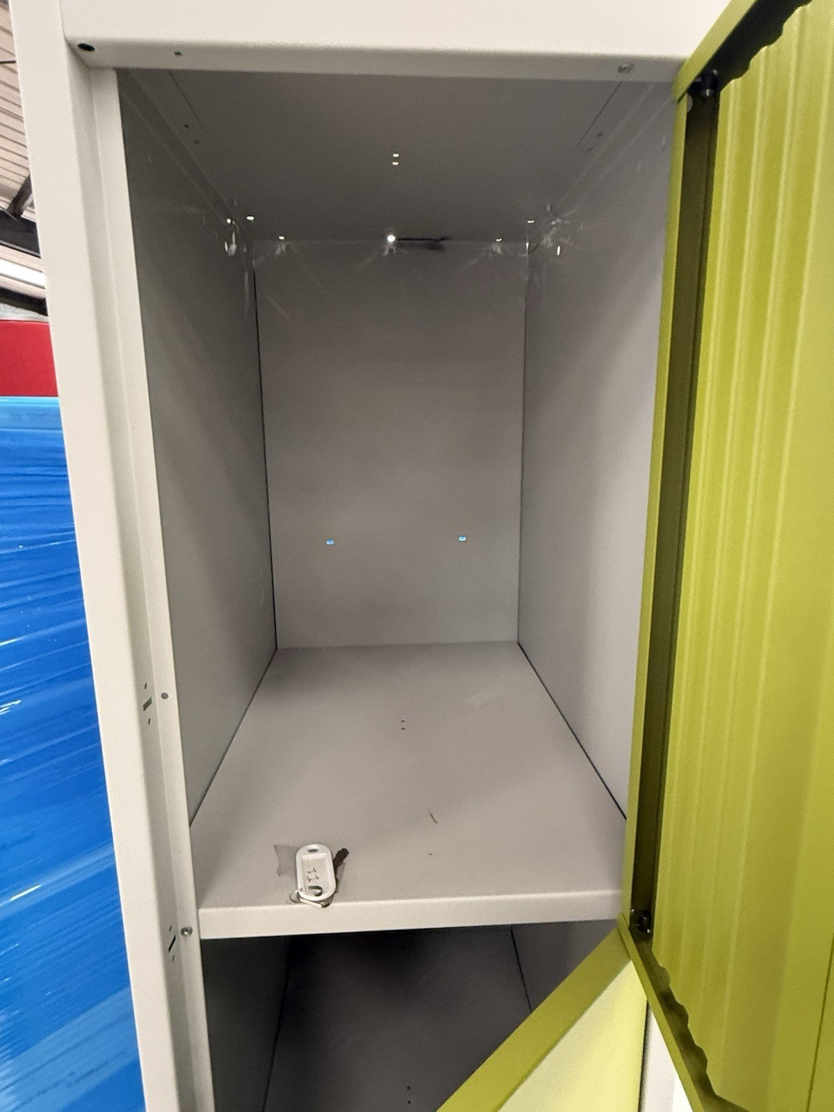 Bisley four door locker in Grey With Green Doors Height 1800mm Width 300mm